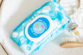 Stork & Sun baby wipes pack with the one-hand pop top, made with coconut oil